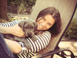 Brittany Maynard, 29, who is terminally ill with brain cancer, sits with her Great Dane, Charley. Maynard moved to Oregon where doctor-assisted suicide is legal.