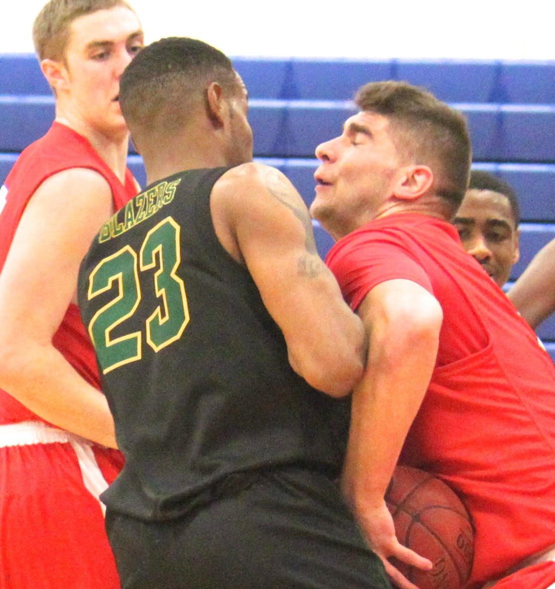 Edin Mehmodovic (31) fights for the rebound in Lincoln Lands game against John Wood Community College