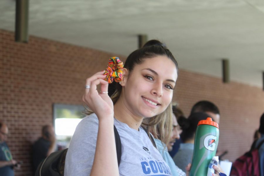 Student at the 16th annual Multicultural Fest, like Briana Gomez enjoy all the different products on display at the festival.