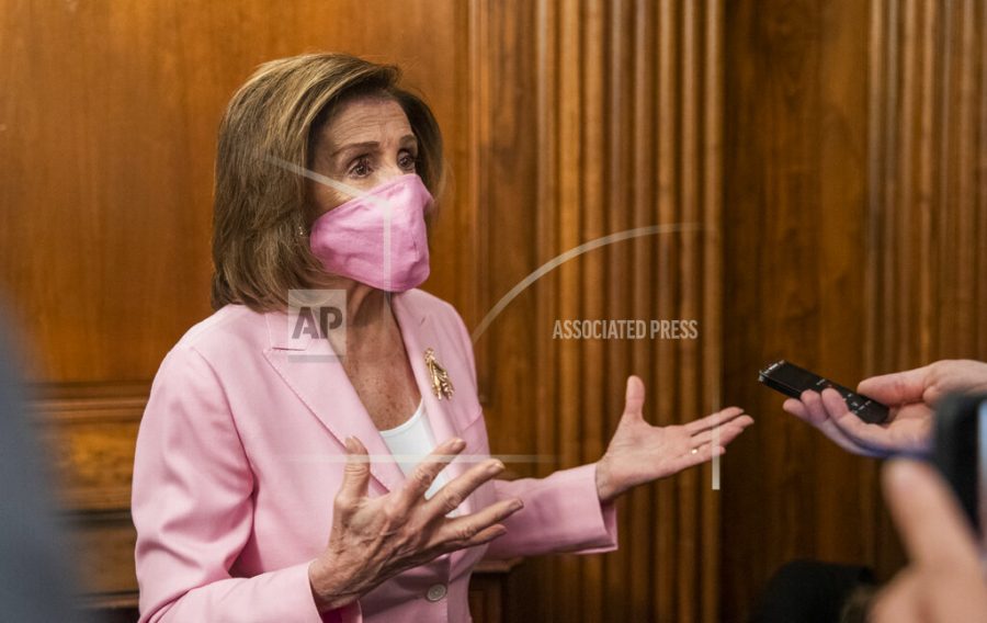 House Speaker Nancy Pelosi of Calif., talks to reporters on Capitol Hill, Tuesday, May 5, 2020, in Washington. (AP Photo/Manuel Balce Ceneta)