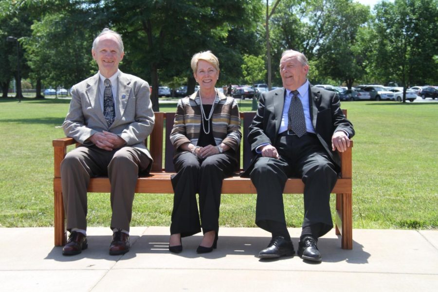 Dr. John Roberts poses with President Charlotte Warren and former LLCC President Robert Poorman on June 4, 2018, when the bench was dedicated to honor Doc Roberts 48-year teaching career. The bench has been removed and sent for repairs because of weather-related deterioration.