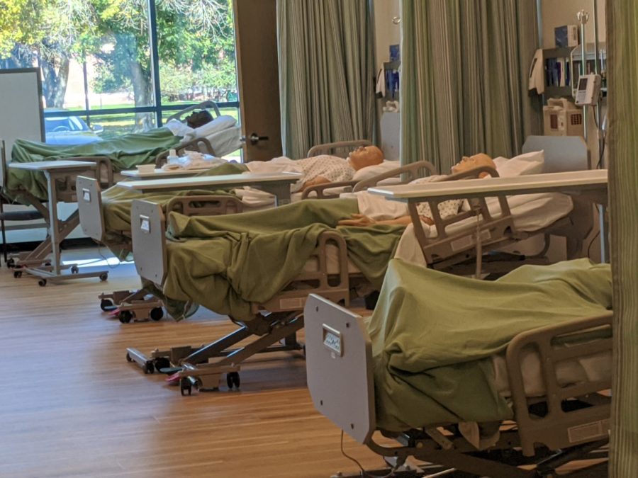 Mannequins+are+seen+in+beds+in+the+Skills+Lab+in+the+Nursing+Education+Center+inside+Montgomery+Hall.+The+updated+facility+increased+the+num-+ber+of+beds+for+students+to+practice+their+skills.