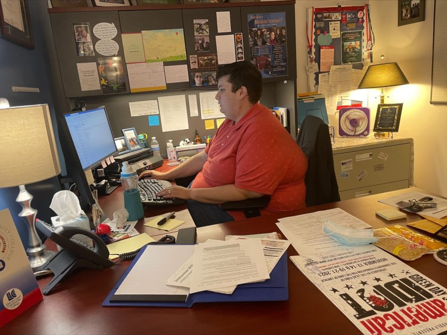 Lamp Photographer Kalei Ramirez of Springfield won an honorable mention for News Photo for this picture of new Student Engagement Coordinator Kyle Roughan working in his office in October 2021. 